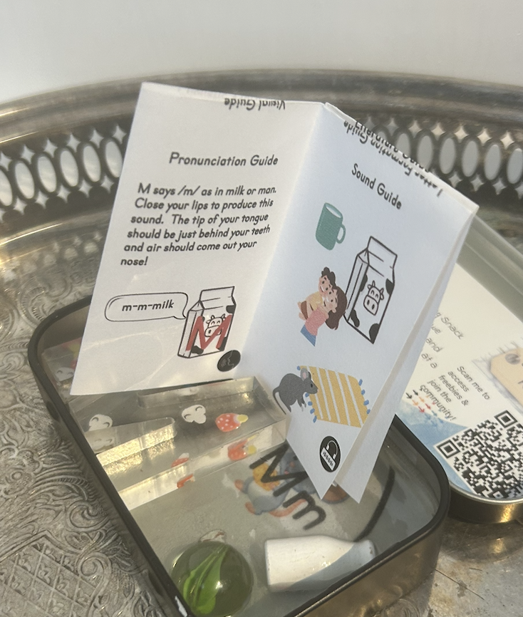 Phonics Minibook sitting in a Tiny Tin